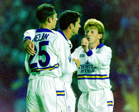 Leeds goalscorer Gary Speed (C) is congratulated by Noel