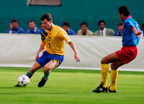 Stefan Rehn mellan två colombianer