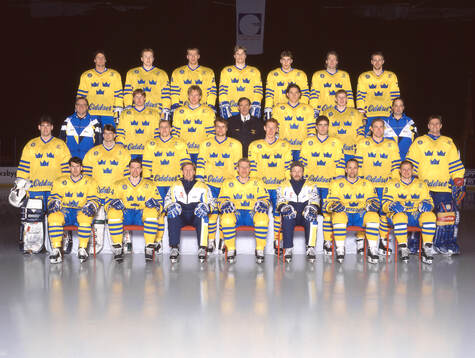 Players and team staff of Sweden pose for a team photo