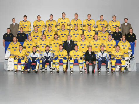 Players and team staff of Sweden pose for a team photo