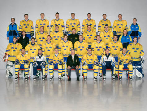Players and team staff of Sweden pose for a team photo