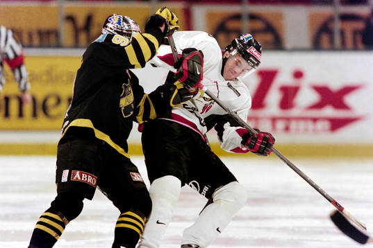 Anders Gozzi, AIK i kamp om pucken
