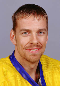 Tommy Albelin of team Sweden poses for a portrait in 1998.