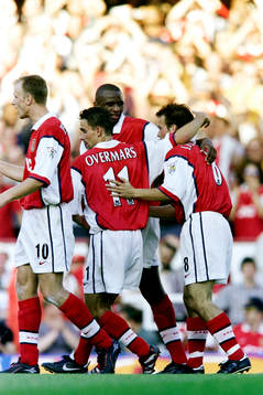 Fredrik Ljungberg, Arsenal kramas om av Marc Overmars