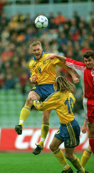 Johan Mjällby och Henrik Larsson, Sverige