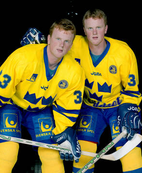 Henrik Sedin and Daniel Sedin of Sweden pose for a photo