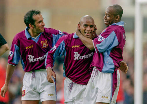 Trevor Sinclair (C) of West Ham celebrates his goal with