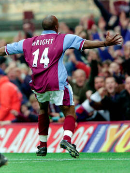 Ian Wright of West Ham celebrates his goal