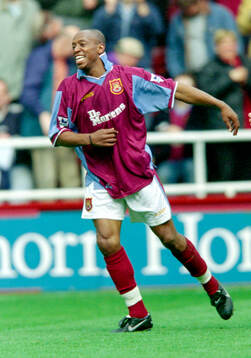 Ian Wright of West Ham celebrates his goal