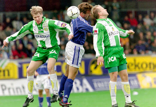 Hammarbys Patrik Andersson och Kaj Eskelinen mot